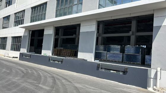 Nivelateur de quai télescopique haute performance pour le positionnement précis des lèvres et les centres logistiques avancés